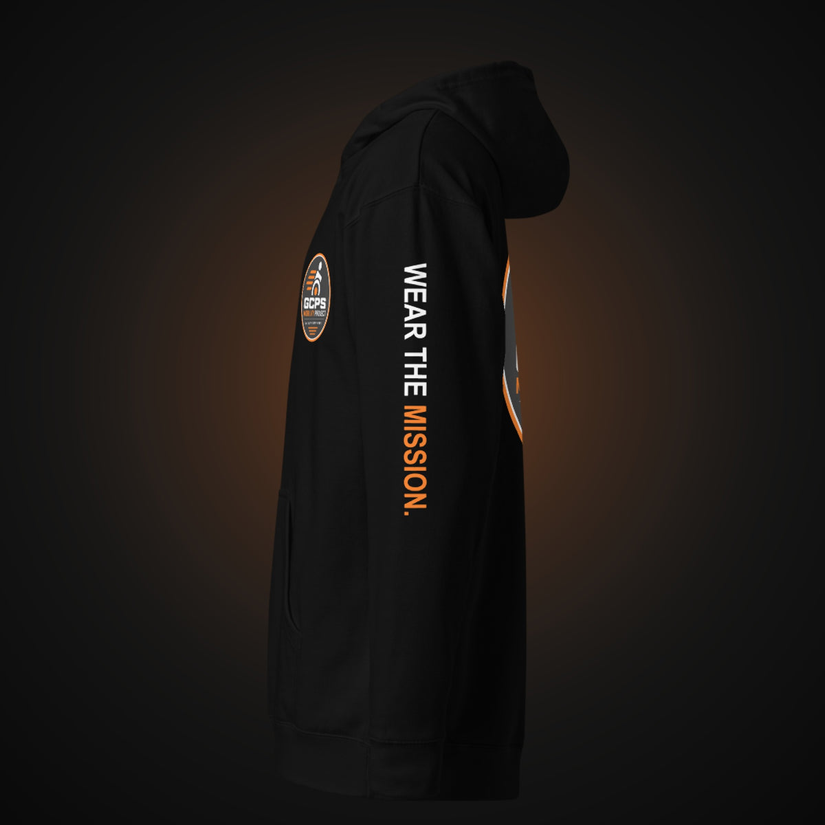 Left side of the black GCPS Mobility Project Hoodie showing "Wear the Mission" printed down the sleeve