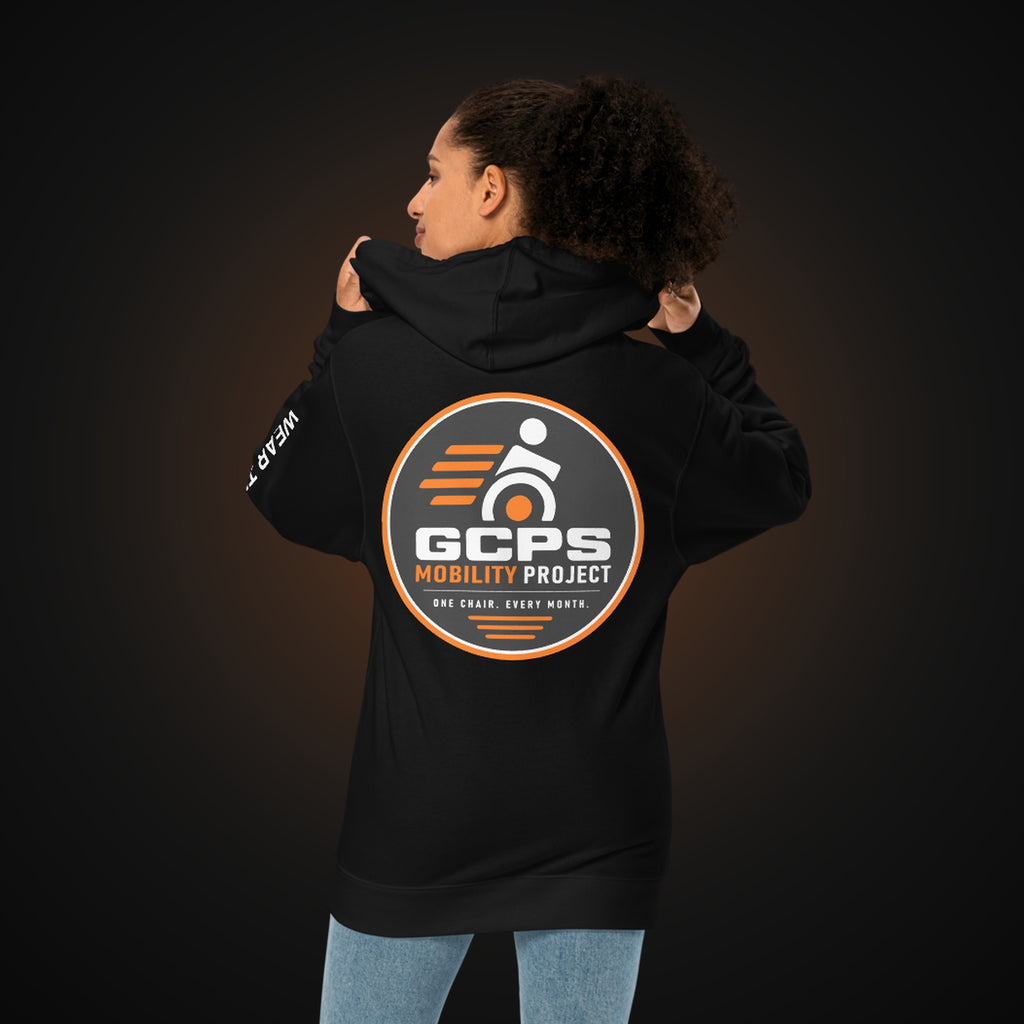 Person wearing the black GCPS Mobility Project Hoodie, back view showing the large GCPS Mobility Project badge